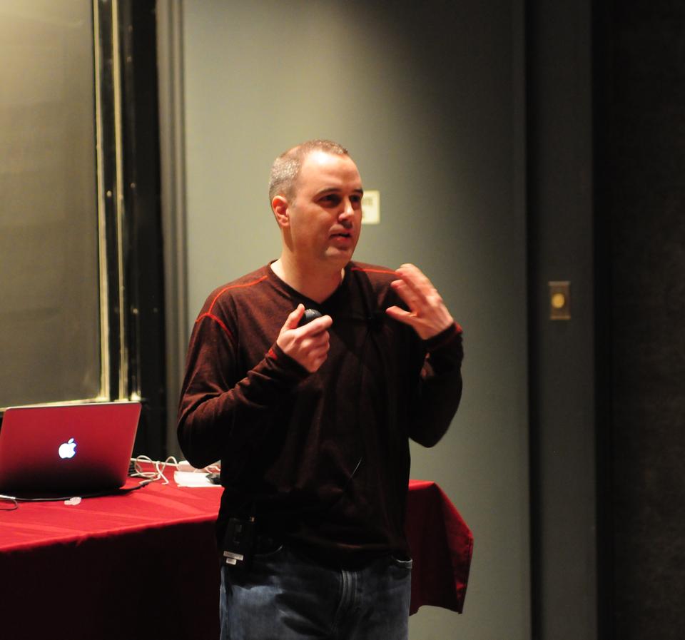 Brian Scholl, professor of psychology, speaks about the role of fMRI in cognitive science research in the Science Center D on Thursday. 
