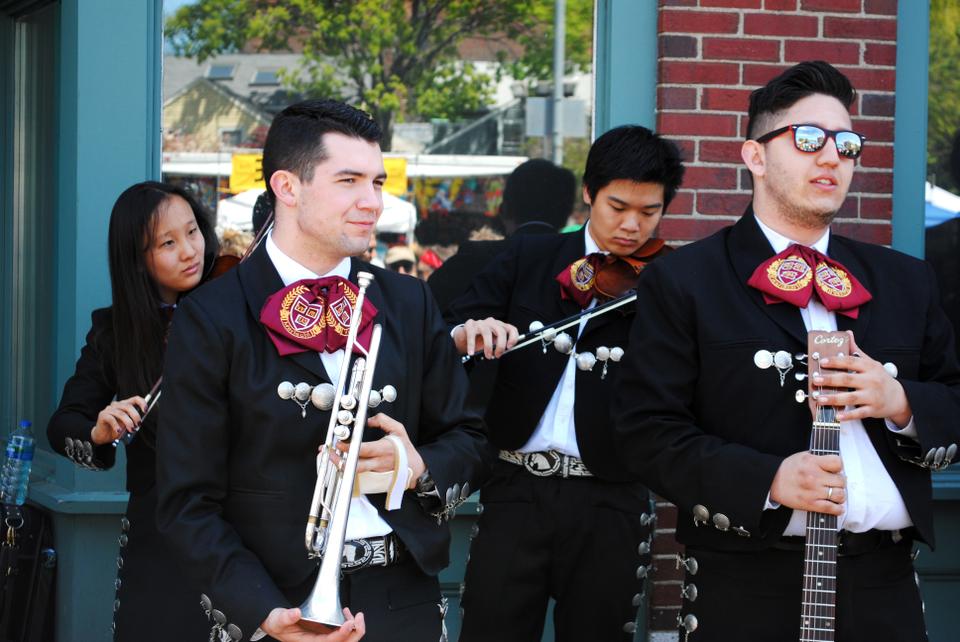 Members of the Mariachi Veritas perform along Church St. at the 30th Annual MayFair in Harvard Square. Mayfair took place for much of the day on Sunday and involved several local businesses.