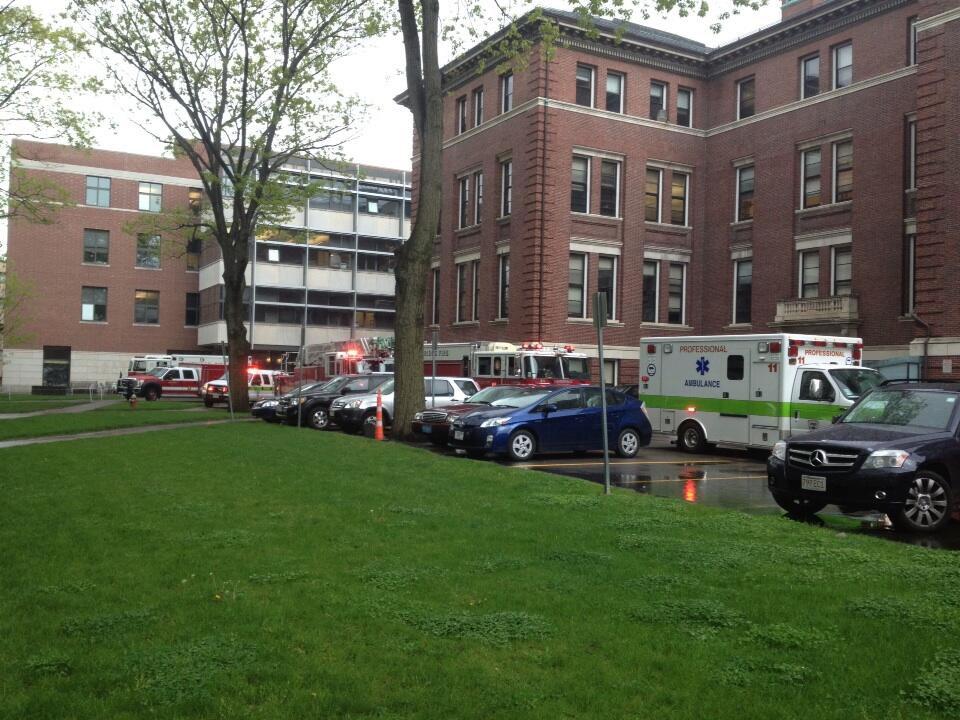 Emergency vehicles, including Boston Fire Department’s hazardous materials team, are stationed outside the Law School's Hauser Hall Thursday afternoon. The fifth floor of the building was evacuated after an envelope sent to Law School Professor Alan M. Dershowitz was found to contain suspicious white powder.