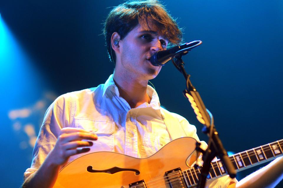 Vampire Weekend frontman Ezra Koenig sings and plays guitar during the band's Boston performance at Agganis Arena on Wednesday evening. The New York City-based rock band is currently on a nationwide tour to promote its third studio album, Modern Vampires of the City, released Tuesday.