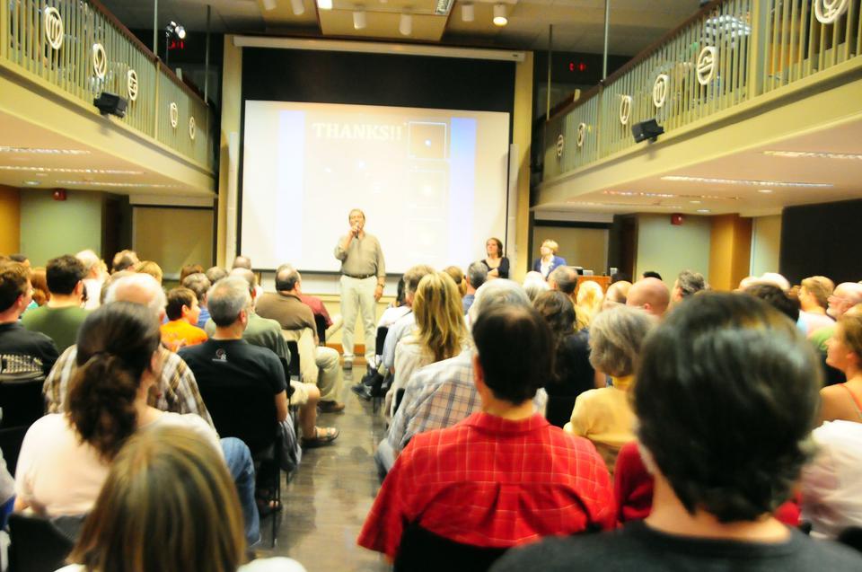 David A. Aguilar, host of the Observatory Night talks, directs questions about black holes to lecture speakers Belinda Wilkes & Francesca Civano. 
