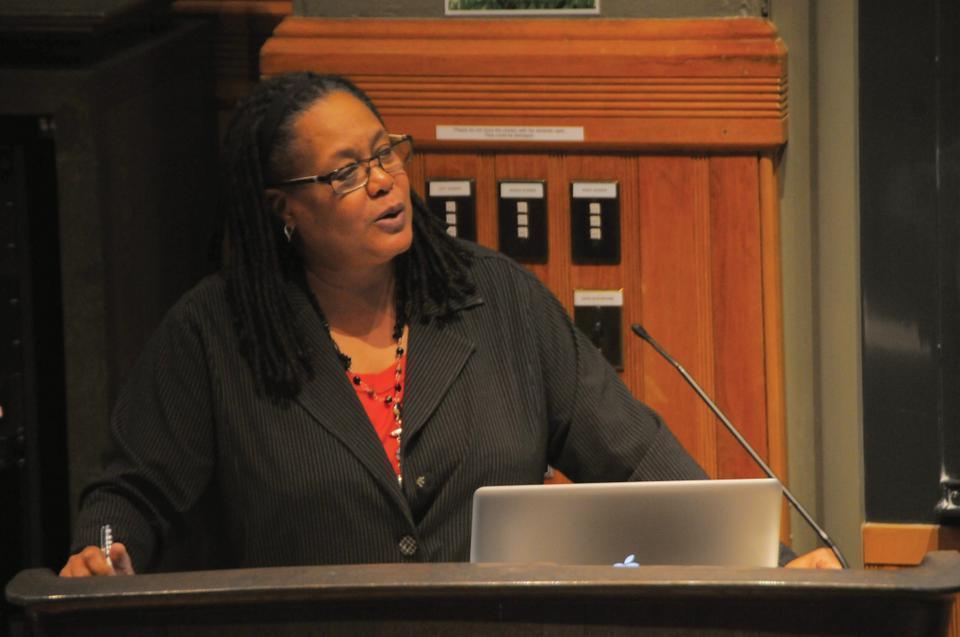 Evelynn M. Hammonds, shown speaking at the Harvard College Governance panel in a file photo from last November, is expected not to return as Dean of the College in the fall, a source confirmed Friday. The confirmation comes weeks after news broke that she and other administrators had authorized two sets of secret searches of resident deans' email accounts, including one that explicitly violated the Faculty of Arts and Sciences privacy policy.