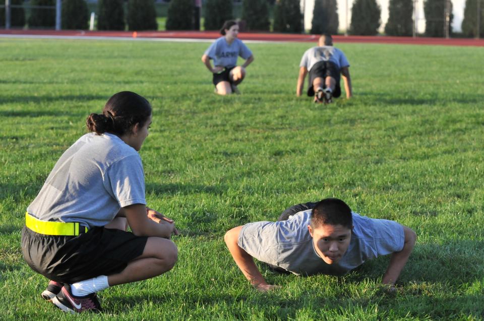 Members of  Harvard/MIT/Tufts Army ROTC practice at 6:30 AM outside Soldiers Field on September 17.  ROTC made its official return to campus this year.