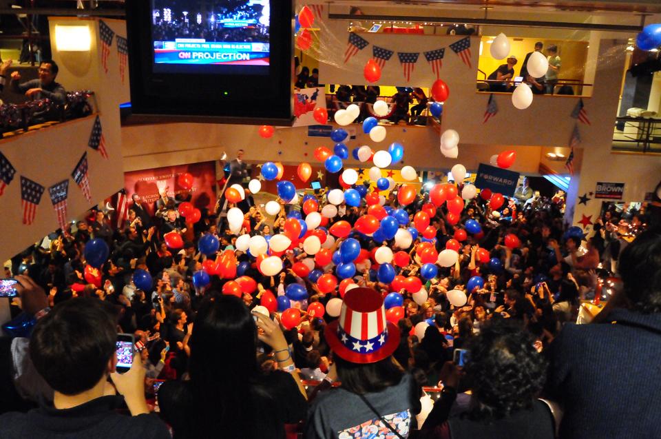 At 12:20 AM on November 7, as CNN projects that Obama’s victory in the Presidential election, balloons drop at the Kennedy School’s IOP election watch party.