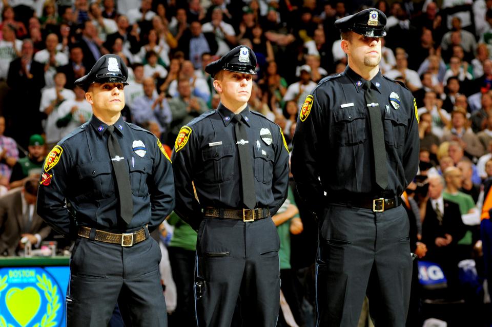 Harvard University Police Department officers Christopher Riccardi, Michael Rea, and Ryan Stanton are honored at the Celtics-Knicks playoff game on April 26 for their service during the marathon bombings. 