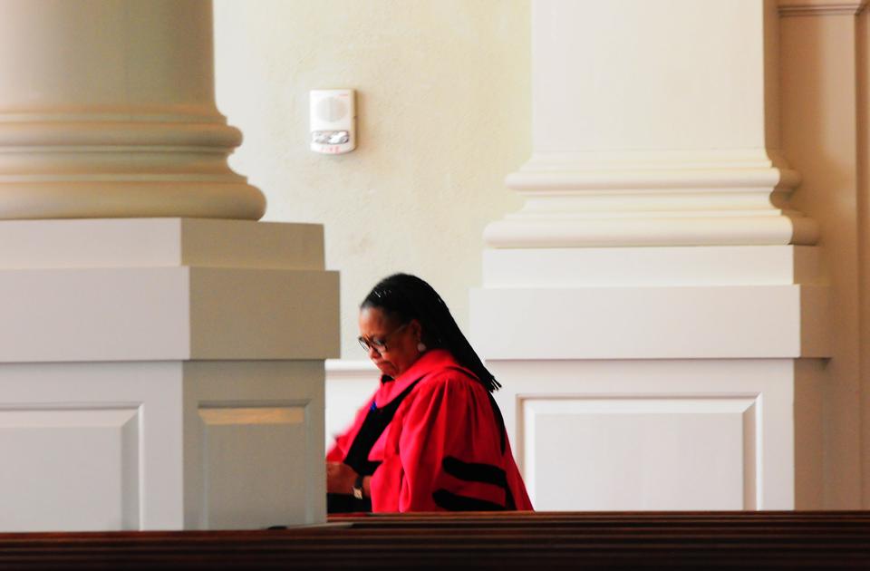Dean Evelynn M. Hammonds walks around Memorial Church before the Baccalaureate Service on Tuesday.  Dean Hammonds's resignation was officially announced Tuesday morning.  