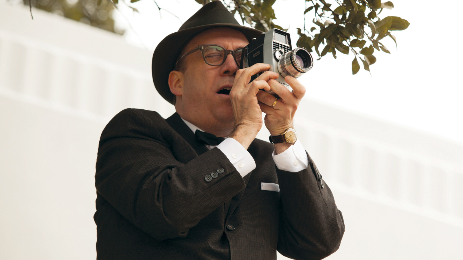 Paul Giamatti plays amateur cameraman Abraham Zapruder in Peter Landesman’s “Parkland,” which examines the assassination of John F. Kennedy ’40.