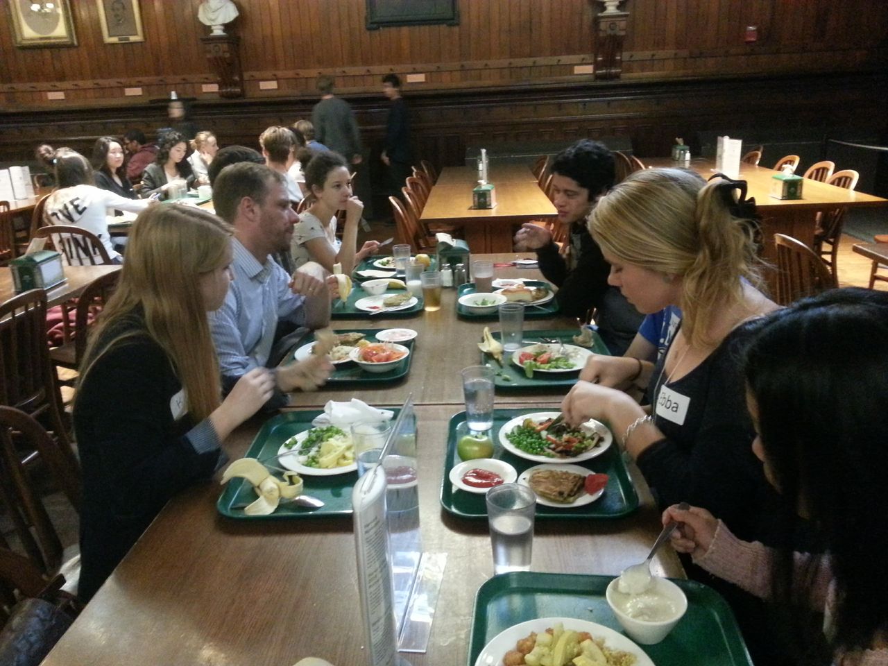 Alexander Rehding, chair of the Music Department, enjoys a meal in Annenberg on Oct. 4 with students from his assigned entryway in Holworthy Middle as part of the new Faculty Fellows Program.