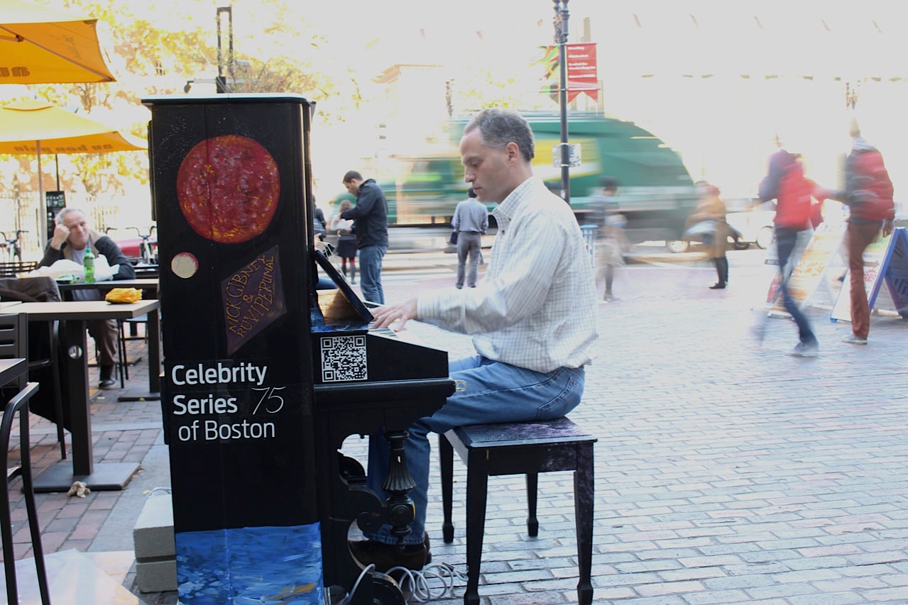 Stephen Leroy, Harvard researcher, enjoys playing the piano in front of Au Bon Pain last Friday afternoon.  Leroy is one of the many who have shared their music abilities on the pianos throughout Cambridge. 
