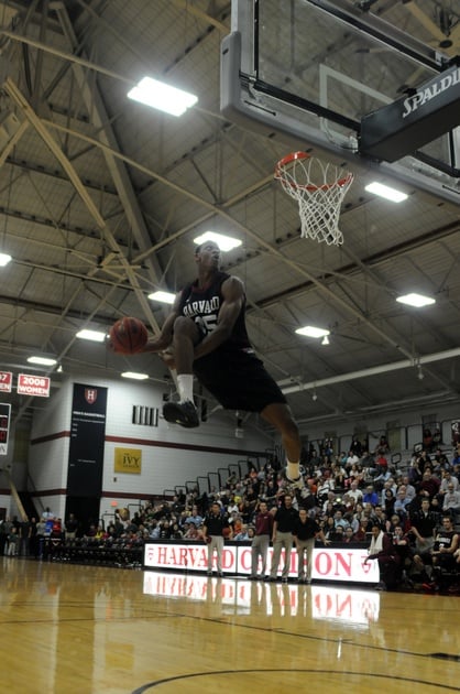 Agunwa Okolie, shown here competing in October's Crimson Madness slam-dunk competition, came off the bench to shoot 6-for-7 from the field in Harvard's 94-86 win at Fordham on Saturday.
