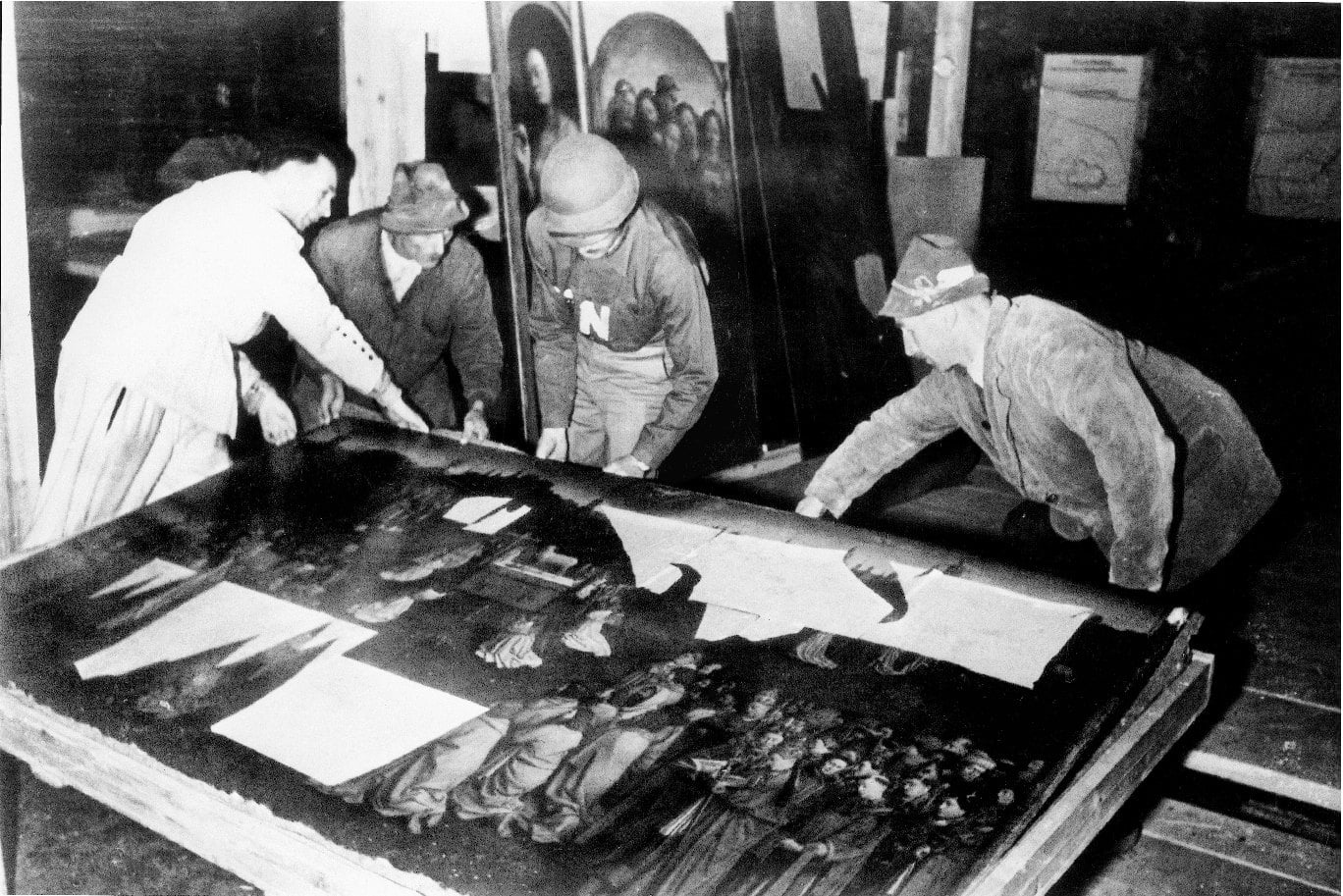 George L. Stout '29 and other soldiers move the Ghent Altarpiece through narrow underground passages in Austria.