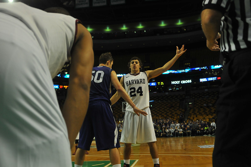 Sophomore forward Jonah Travis opened Harvard's 2013-2014 season with 20 points and 10 rebounds at TD Garden in an 82-72 win over Holy Cross. 