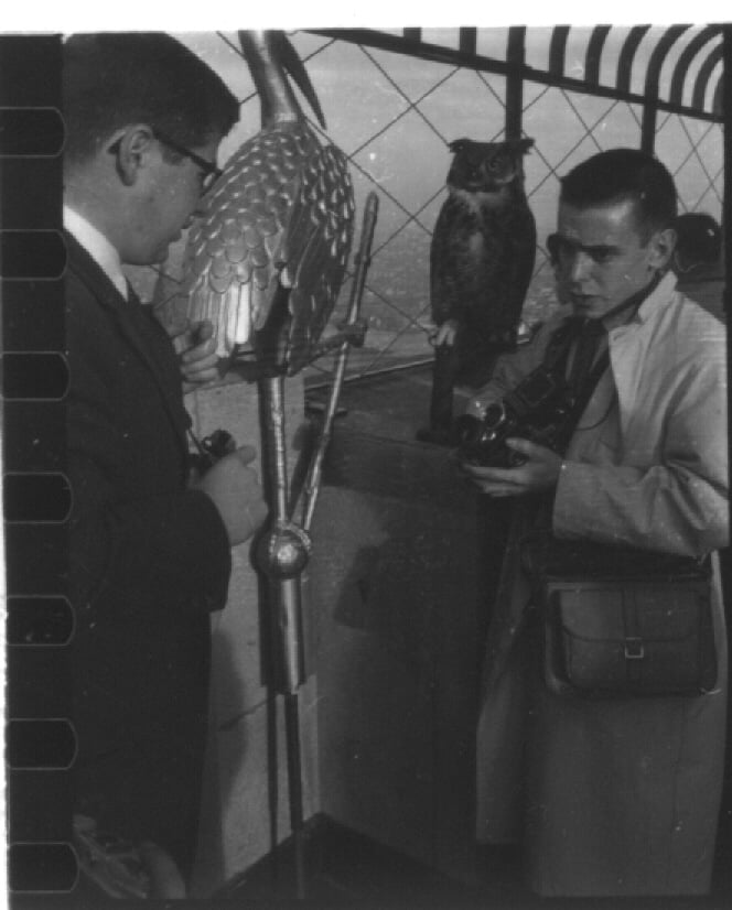 David Royce '56, right, shows off the Thresky Ibis atop the Empire State Building.