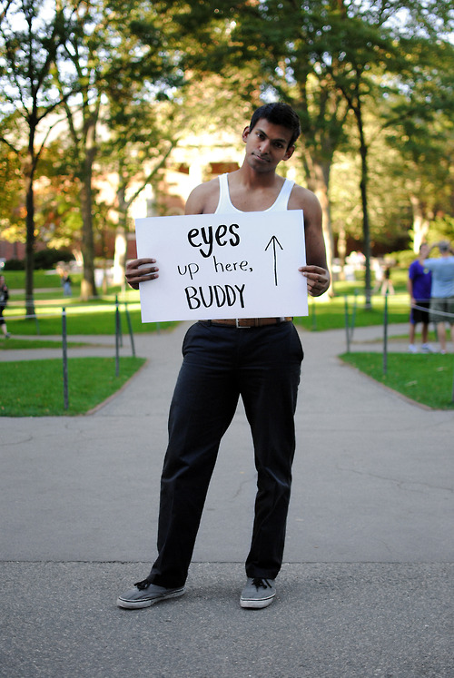 A '15 college student holds a sign for the #emBODYindia campaign. The project features both male and female members of the Harvard community, and seeks to combat the unwanted sexualization of women in India.