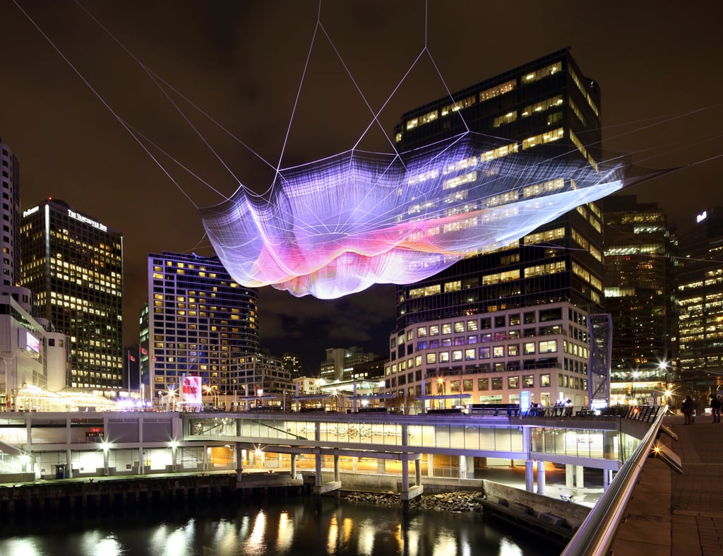 Janet Echelman installed her largest sculpture to date at the 2014 TED Conference. "Skies Painted with Unnumbered Sparks" spanned 745 feet across the waterfront in in Vancouver, suspended from skyscrapers.