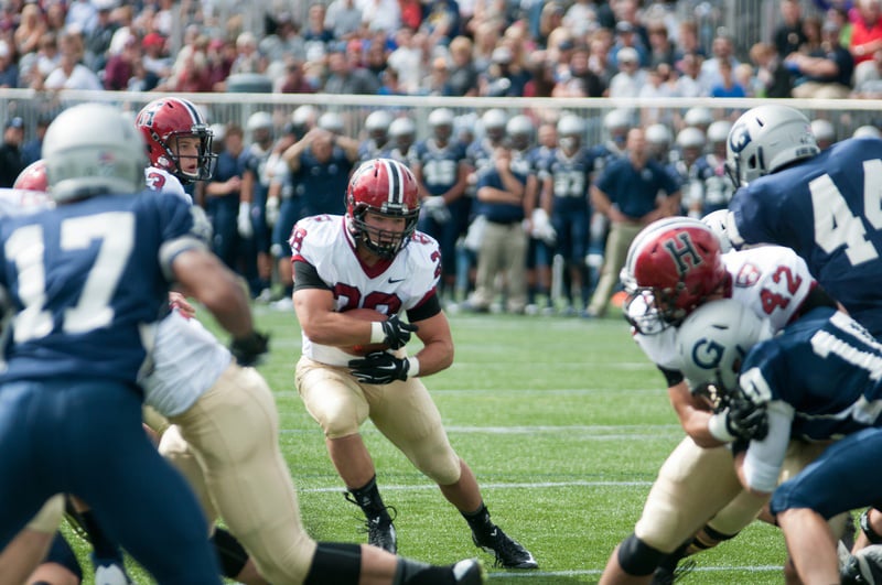 Even with offensive  stars on the sidelines, the Crimson should make quick work against a team of questionable Ivy credentials at Harvard Stadium this Saturday. Running back Andrew Casten (center) will look to build on last week’s performance at Georgetown, where the senior ran for four touchdowns. 