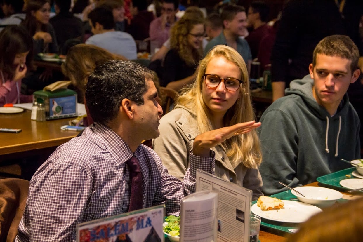 Dean Khurana sits down at lunchtime to chat with freshmen in Annenberg. Khurana says he spends three-fourths of his time talking to students.