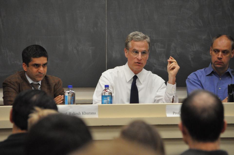From left, Dean of Harvard College Rakesh Khurana sits with professors Robert Kaplan and Allen Ferrell to discuss the Harvard Management Company in Emerson Hall on April 4, 2012.