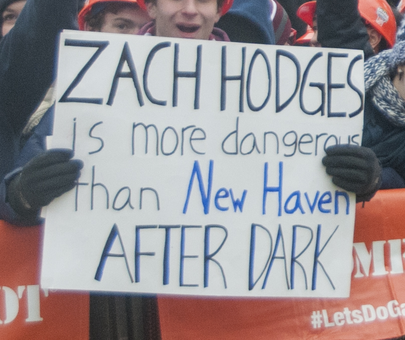 A student holds up a sign about Zack Hodges ’15 who is a linebacker for the Los Angeles Rams.
