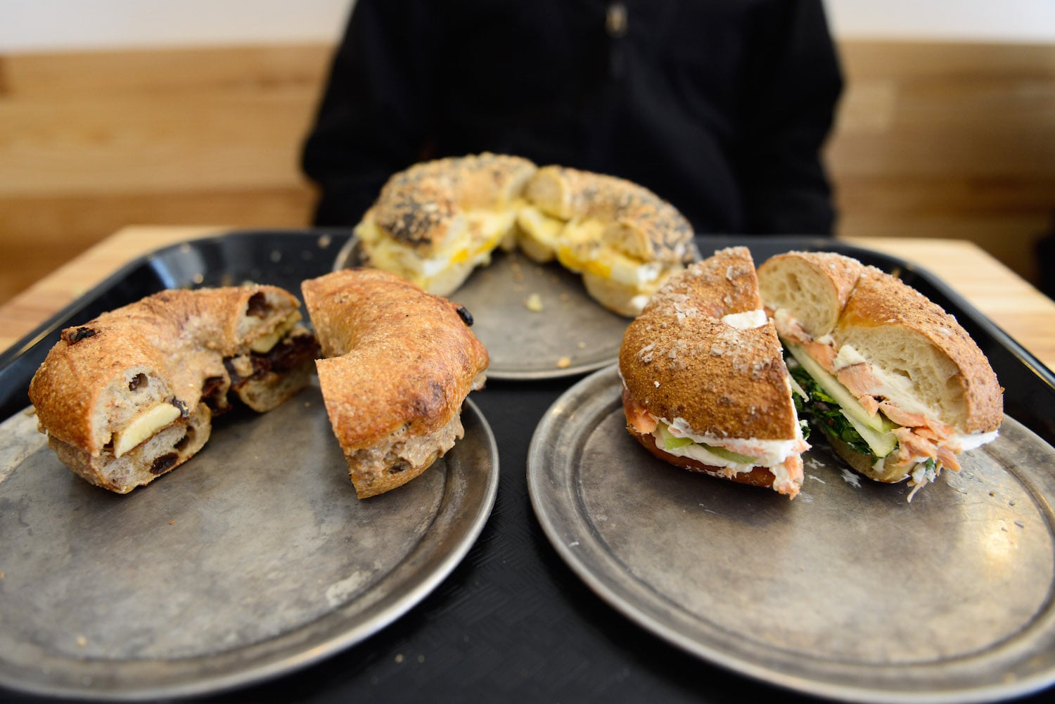 FM tried out the three bagel sandwiches (L to R): The T-Rex on cinnamon raisin, the Egg on everything, and the Salmon on pretzel. 
