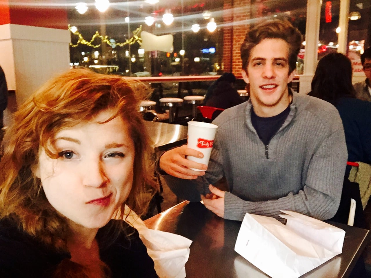Our staff writer Brooke and her Datamatch date, posin' with his cup #tastyburger