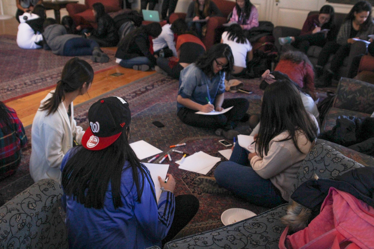 Students break down into small groups to discuss issues centered around the media’s roles and effects in shaping conceptions of body image during Body Image And Disordered Eating in Women of Color on Friday afternoon in the Lowell JCR.  This event was hosted by the Harvard College Women’s Center as part of Women’s Week.
  