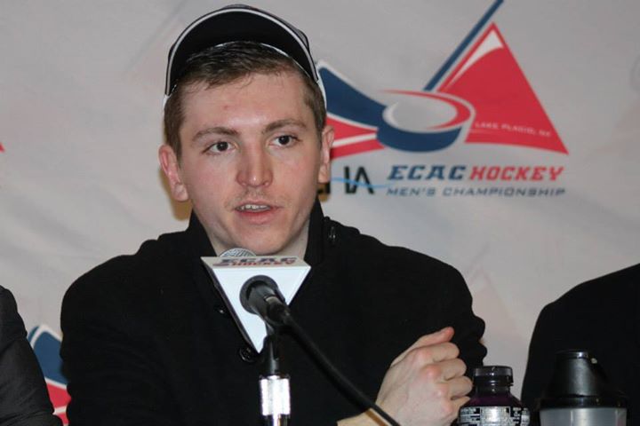Junior forward Jimmy Vesey, shown speaking at a press conference after the Crimson's win in the ECAC championship game on March 21, has elected to return to school for his senior season.