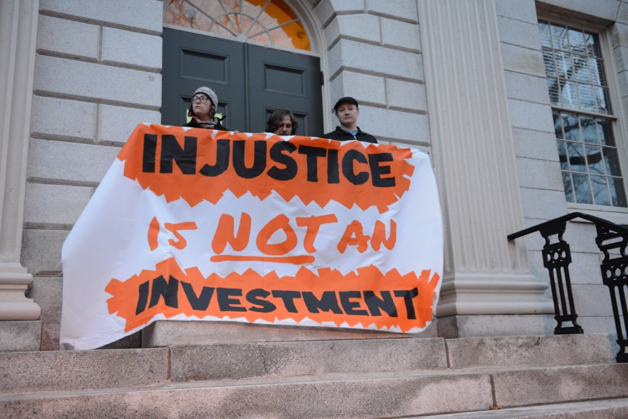 On the third day of the planned weeklong demonstration organizers are calling "Harvard Heat Week," protesters blockade University Hall early Tuesday morning.