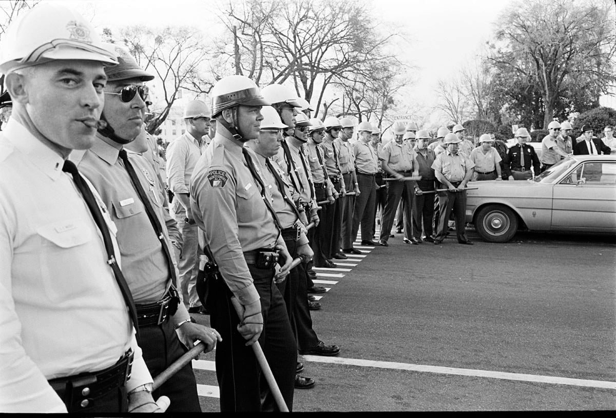 Montgomery police waited for demonstrators on March 17 and 18, 1965 during the voting rights march from Montgomery to Selma. This photograph appeared in The Crimson later that month.