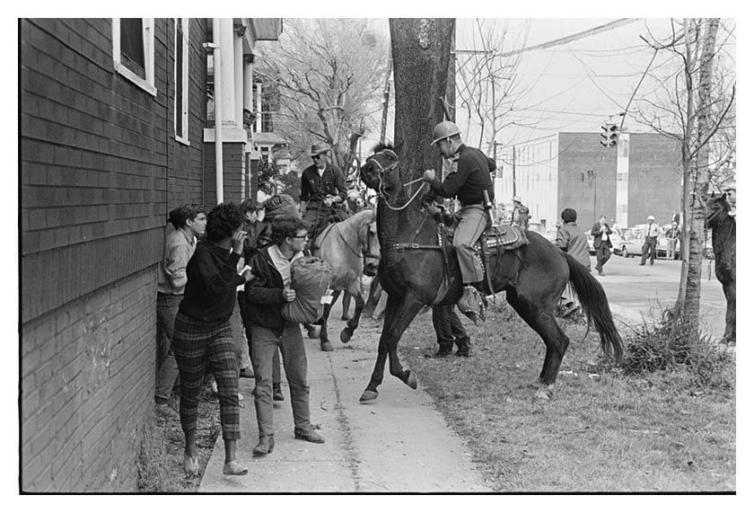 In Montgomery, Alabama, sheriffs on horseback trampled voting rights marchers near the state Capitol on March 16, 1965. Crimson photographer Glen J. Pearcy photographed the voting rights march from Selma to Montgomery in the spring of 1965. 