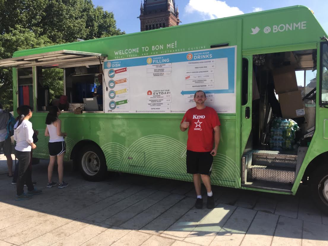 James poses near the BonMe food truck, where he works in.