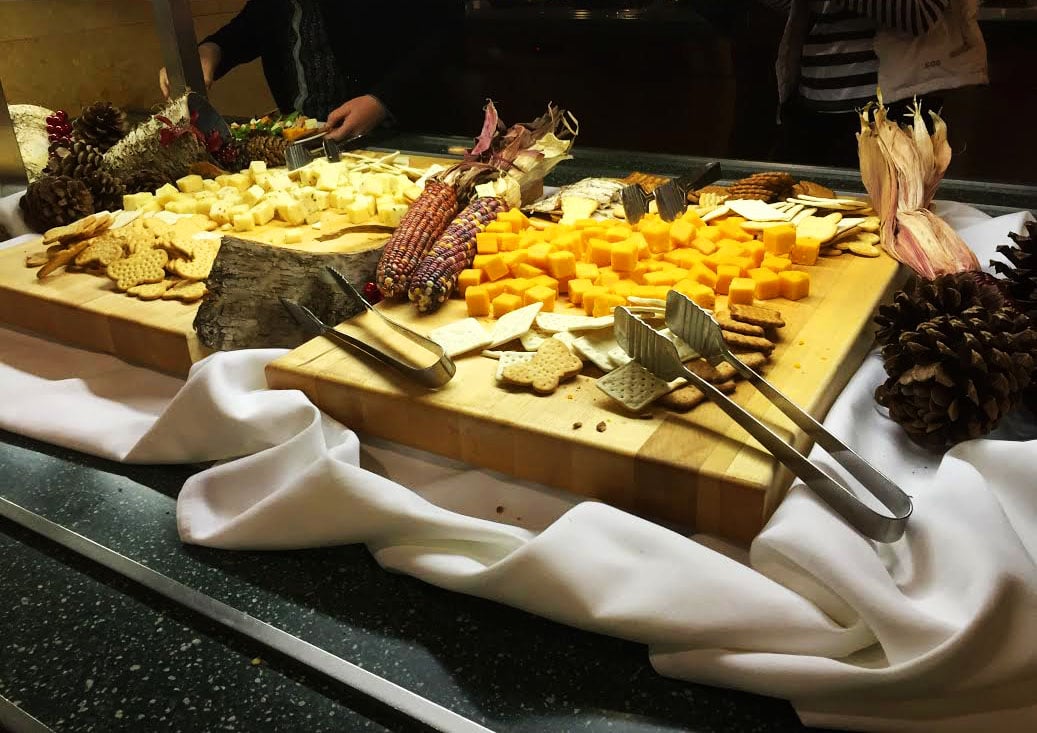 Adams students enjoy an array of cheese at community dinner, which was themed “New England Harvest Dinner” this Thursday evening.  Other local and sustainable menu items included lobster bisque, all natural chicken with local heirloom apple and onion sauce, and gnocchi with sage brown butter garnished with dice butternut squash.  