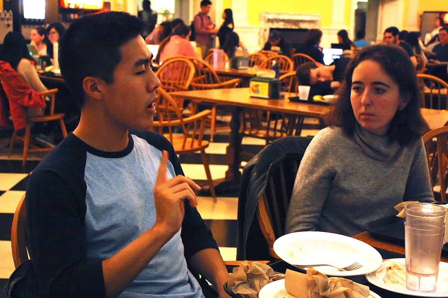Samuel Oh ’18 practices signing at the American Sign Language table in Lowell Dining Hall on Nov. 9.