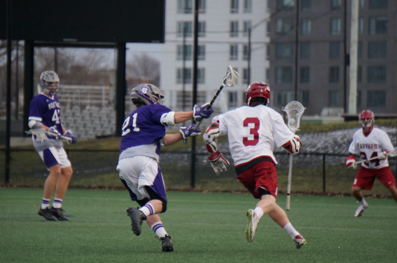   Senior attacker Devin Dwyer, shown earlier this season against Holy Cross currently sits fourth in the nation with a 43 game point streak. He leads the offensive charge for the Crimson with 28 goals on the year, and  became the first Harvard player since 2012 to record at least 50 points in a season.
