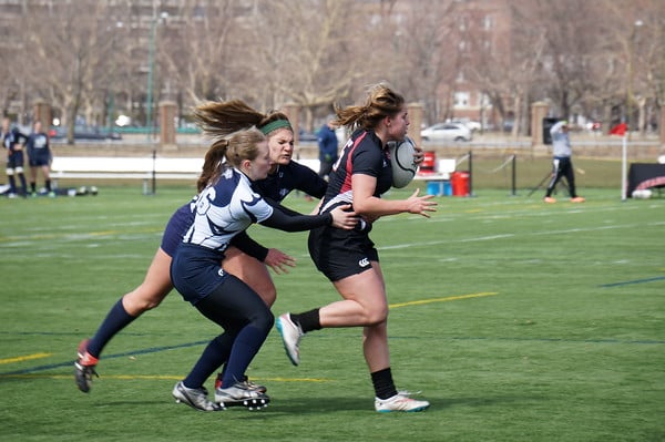 Junior Claire Collins, seen in action above, helped the Crimson capture the first Ancient Eight title in program history. 
