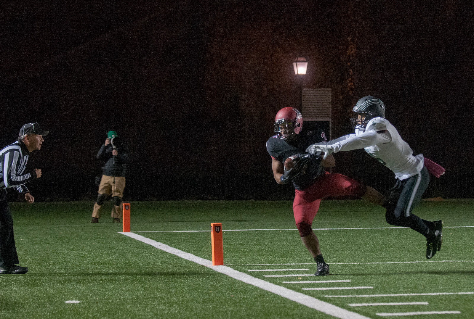 Senior wide receiver Seitu Smith;s 39-yard touchdown catch on fourth-and-12 with 6:38 remaining in the fourth quarter kept the Crimson's hopes of a comeback alive, cutting the Big Green's lead to 13-7 at Harvard Stadium.