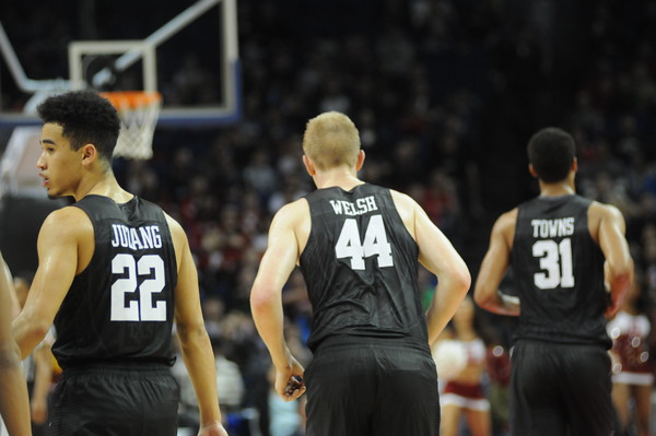 Harvard's seven freshmen, including (from left to right) guard Christian Juzang, forward Henry Welsh, and guard Seth Towns, have seen significant playing time in the Crimson's first two regular season games. 