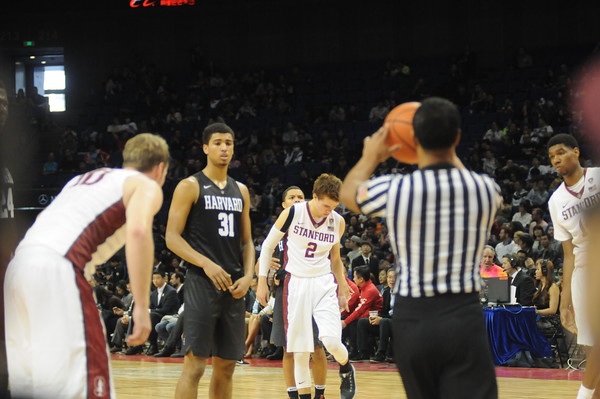 Freshman guard Seth Towns, shown in previous action against Stanford, led the Crimson with 17 points against UMass, but it wasn't enough to secure the win. 