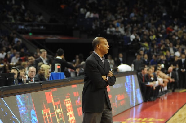 Harvard coach Tommy Amaker, shown here in the team's 2016-2017 season opener against Stanford in Shanghai, became the winningest coach in program history Wednesday night as his team beat Boston College, 74-66.
