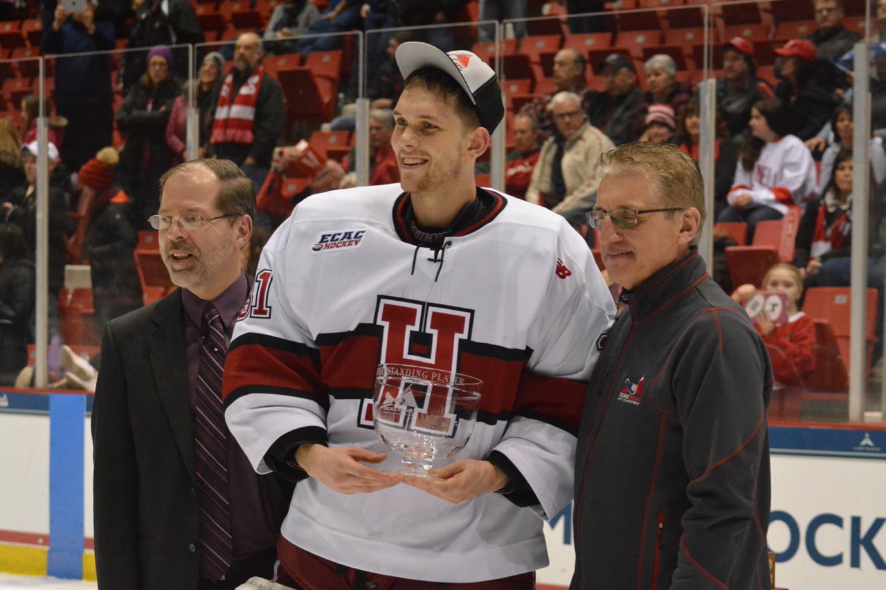Merrick Madsen receives the tournament's Most Outstanding Player award.