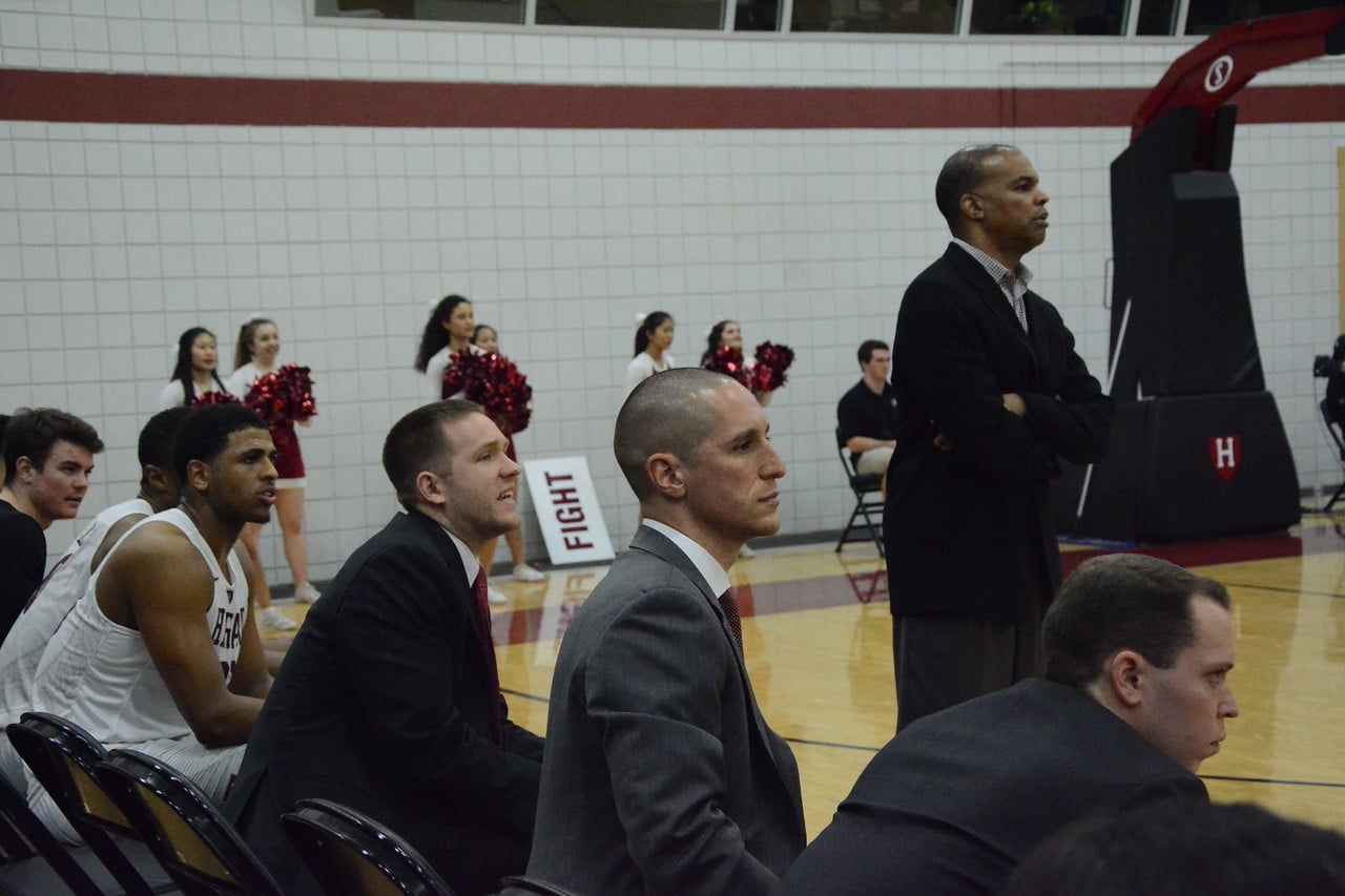 Basketball head coach Tommy Amaker and other coaches across Harvard athletics rely heavily upon the contributions of team managers, who work tirelessly to streamline team operations.