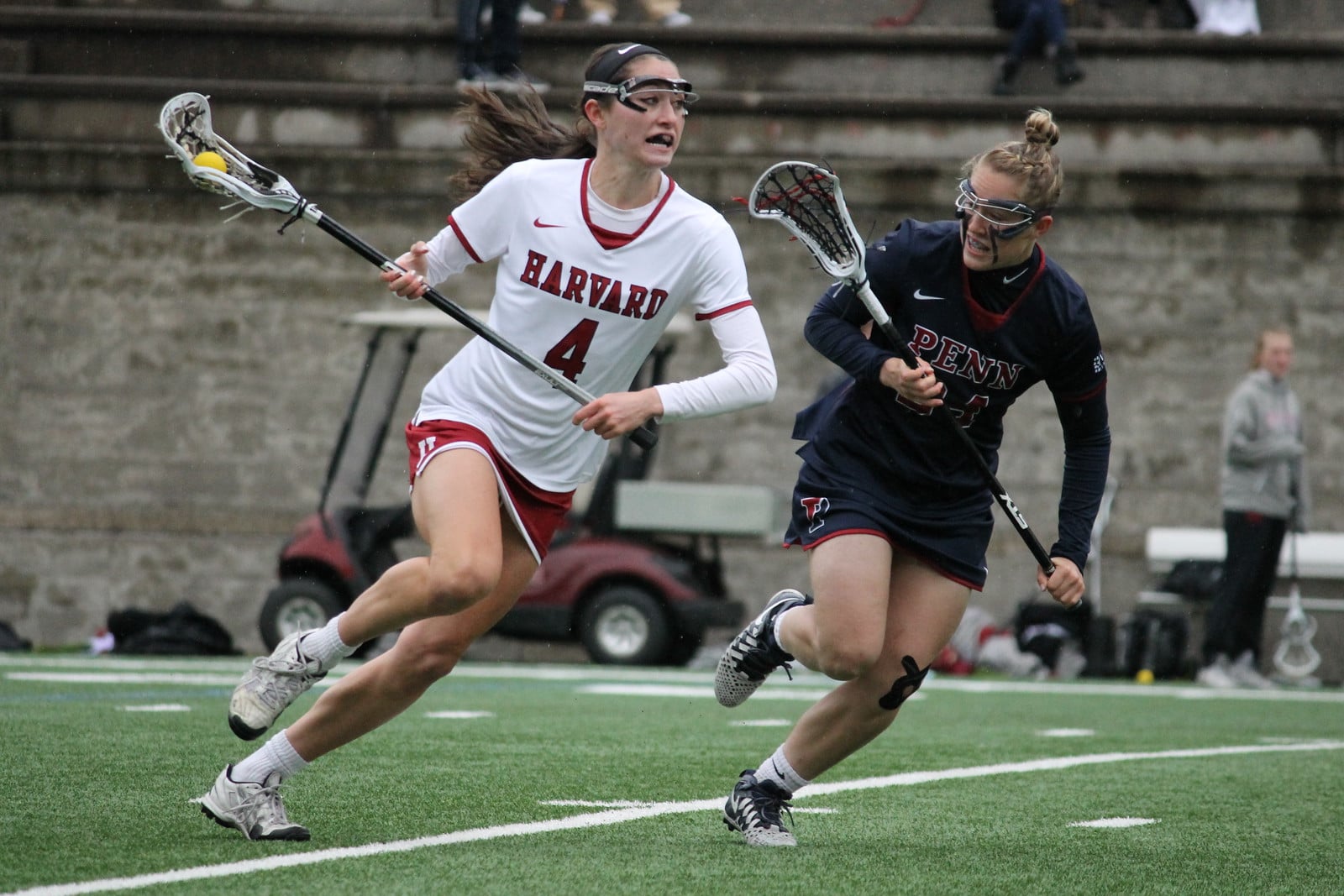 Tri-captain Emma Ford, pictured here driving to the net earlier in April against Penn. After this weekend's matchup with No. 11 Cornell, the Skaneateles, N.Y., native has 23 ground balls and 15 forced turnovers while manning the back line for the Crimson this season.
