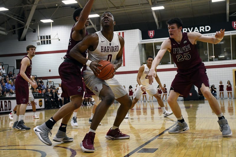 Forward Chris Lewis received a personalized pitch from SEAS professor Harry R. Lewis ’68.