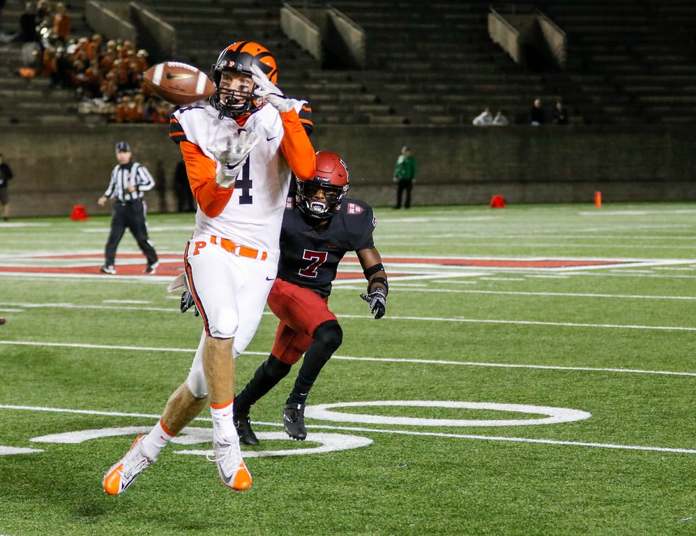 Princeton junior wide receiver Jesper Horsted brings in a catch before turning upfield, where he is met by Harvard senior defensive back Raishaun McGhee. The Crimson corner finished with seven total tackles, including one for loss, in his team’s relatively porous effort against the Tigers.