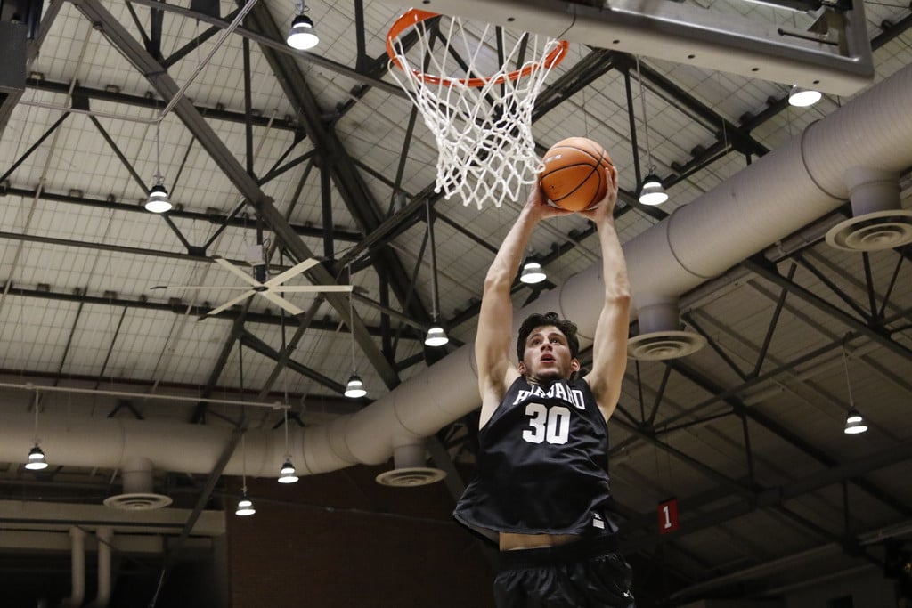 Djuricic goes up for the slam at this year's Crimson Madness. The freshman is one of three Canadian players on Amaker's roster.