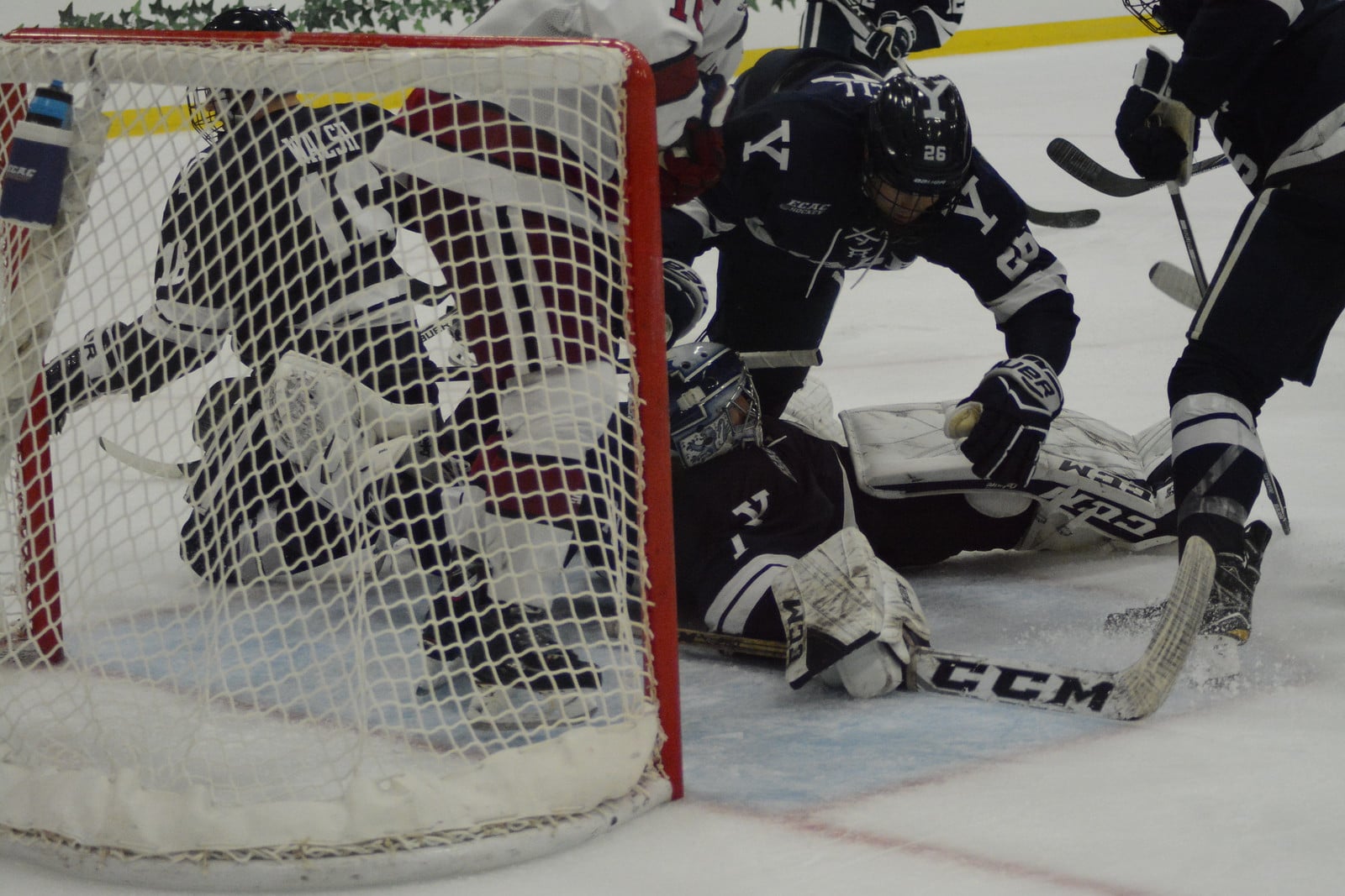 Despite the loss, Harvard threw 35 shots on Sam Tucker's cage. The Yale net-minder faced chaos around his paint all night.