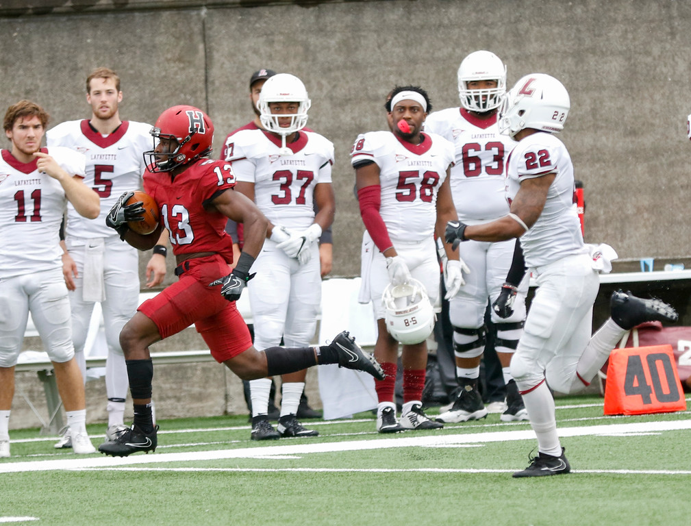 Junior wideout Adam Scott sprints past the Lafayette sideline during his 90 yard touchdown kickoff return. 