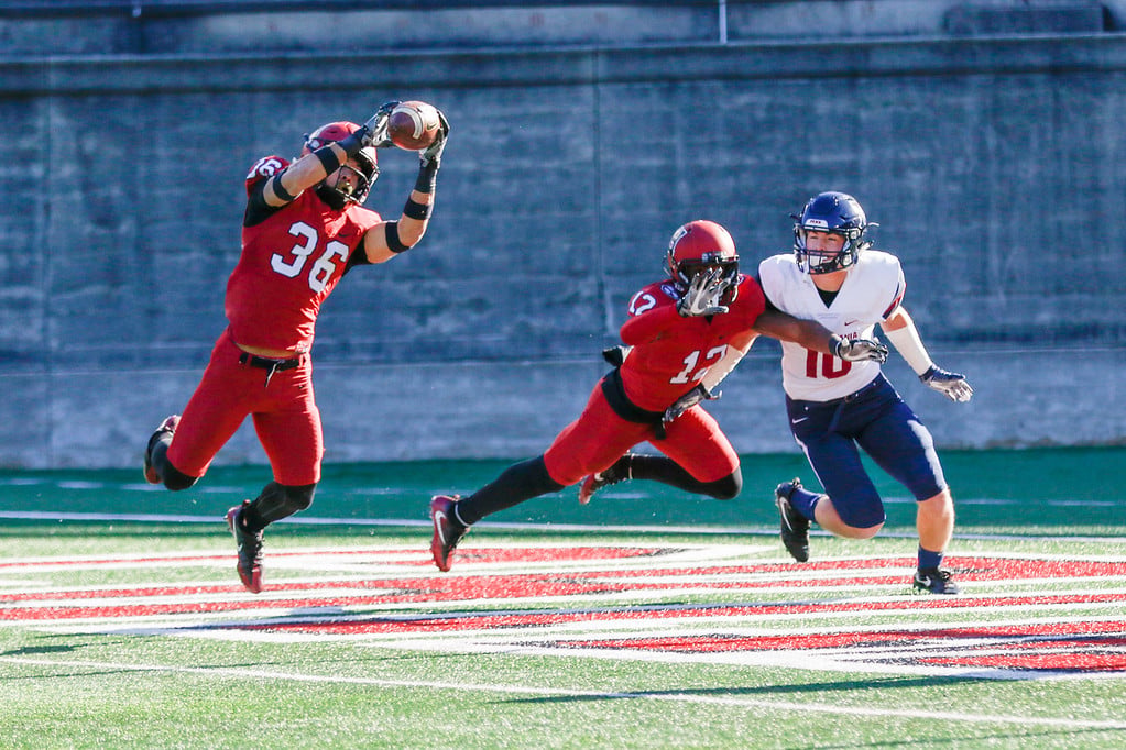 On the final play of the half, senior safety Tanner Lee picks off Penn, preventing a field goal on the subsequent play.
