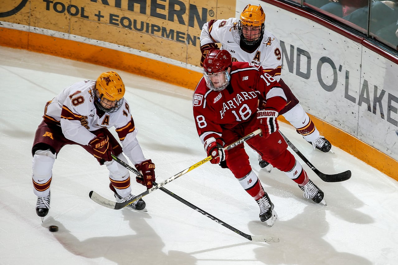 On Saturday, key offensive pieces like blue-liner Adam Fox (pictured here) tried all game to get the Crimson offense going, but to no avail, as the team logged just 16 shots in the overtime loss. Harvard's lack of shot attempts comes as somewhat of a surprise considering the wider Olympic-sized rink at Mariucci Arena.