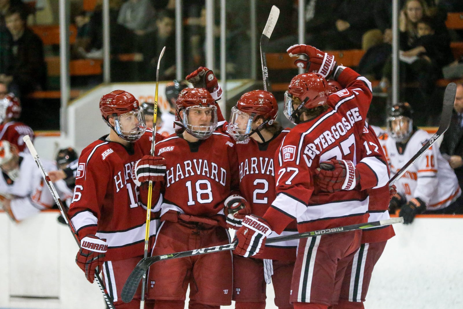 The top power play unit celebrates after freshman Reilly Walsh's one-time snipe from the right circle. Walsh kicked off the scoring for his team, who executed again on the man advantage later in the period.